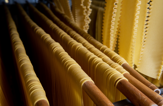 Slow dried pasta on a drying rack