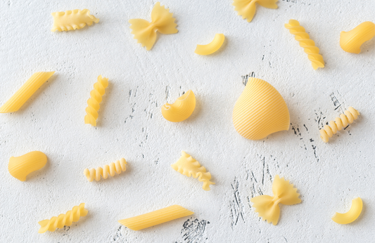 Die cut, different shaped pasta against a white background