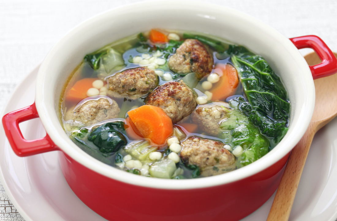 Red bowl of cooked Italian Wedding soup