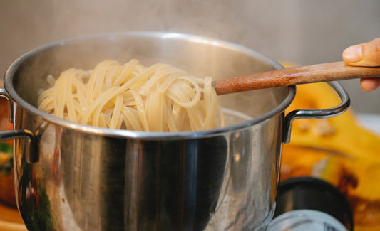 Pasta cooking in a pot of boiling water