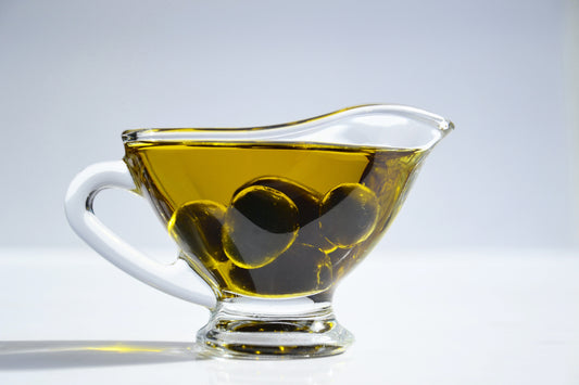 glass of Dagostino extra virgin olive oil 