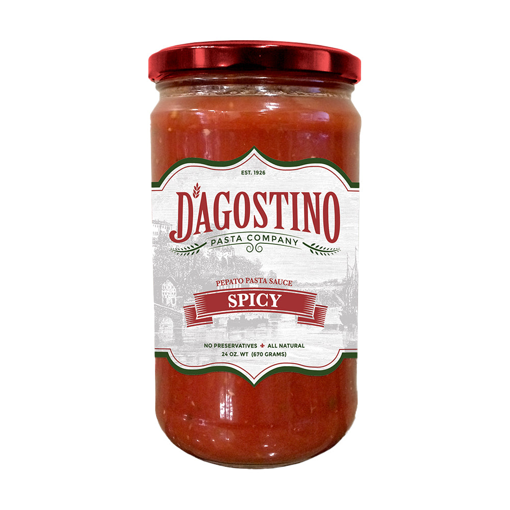 Close up of a jar of Dagostino Spicy Tomato Sauce against a white background.