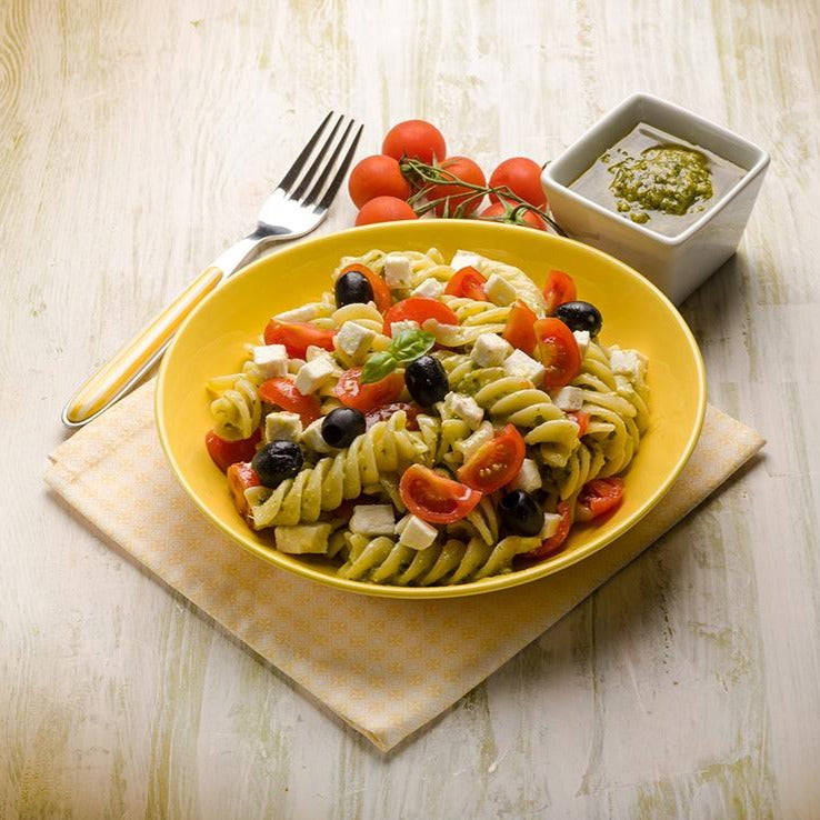 Dagostino Rotini Pasta Salad with tomatoes, pesto, olives, and feta cheese