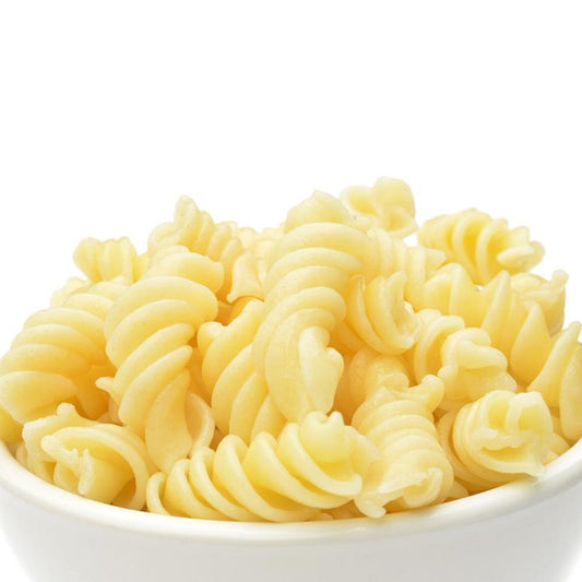 Close up of a white bowl filled with Cooked Dagostino Rotini Pasta