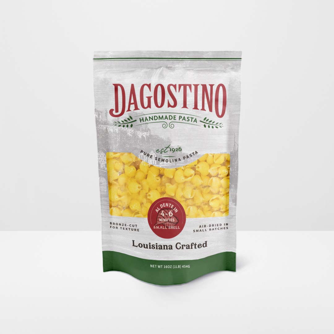 16 ounce bag of small shell pasta against a white background