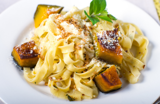 Creamy Dagostino Fettuccini Pasta with Butternut Squash on a white plate